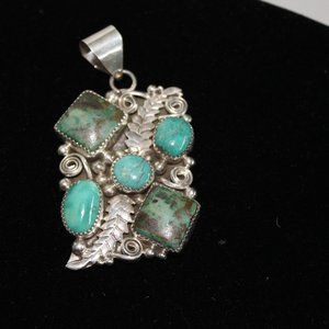 Signed Native American Navajo Sterling Silver Turquoise Pendant.